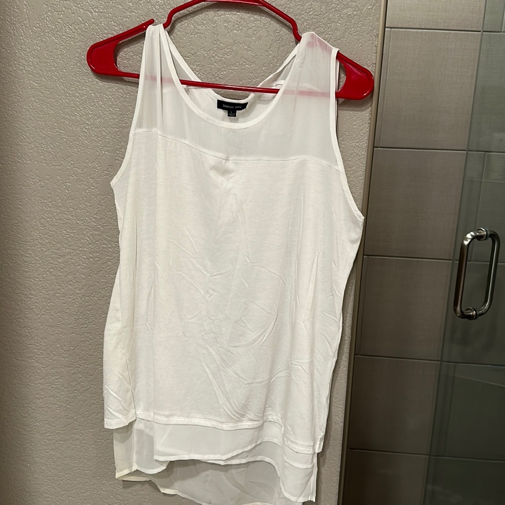 Sleeveless cream blouse